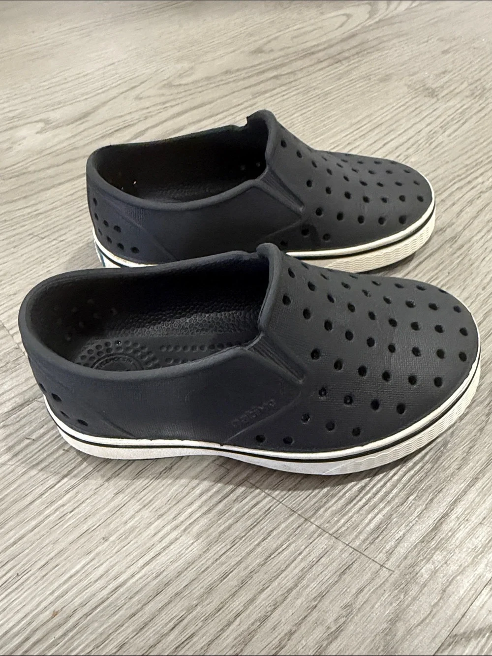Native Black Perforated Slip-On Loafers with Off-White Trim Toddler C8